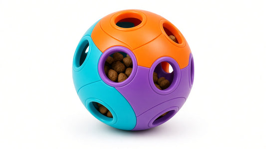 Studio product hero: treat dispensing food ball on white